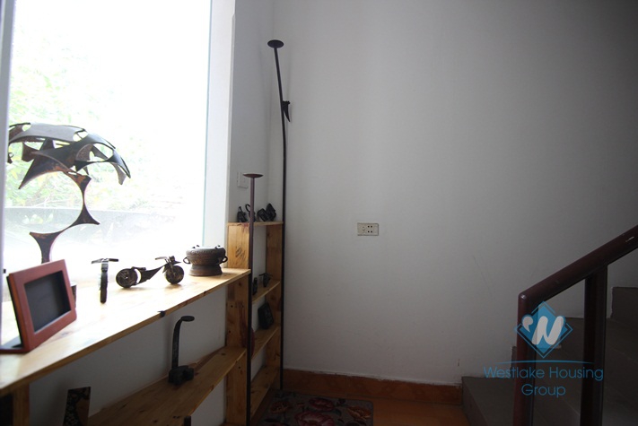 Tiny artisan's house with a balcony for rent in Tay Ho